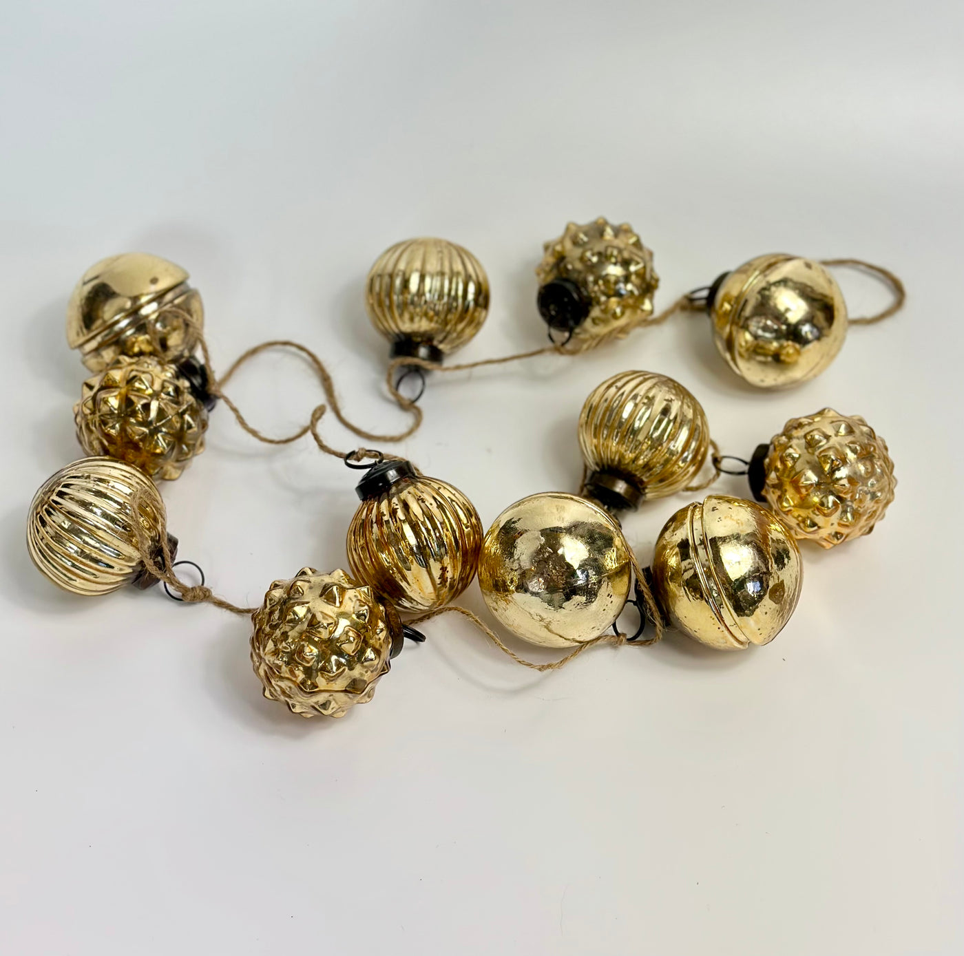 Christmas chain made of gold ornaments